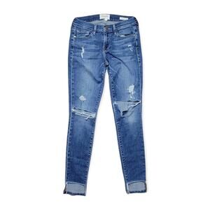 Frame Le Skinny De Jeanne Distressed Skinny Jean in Jewell Size 25